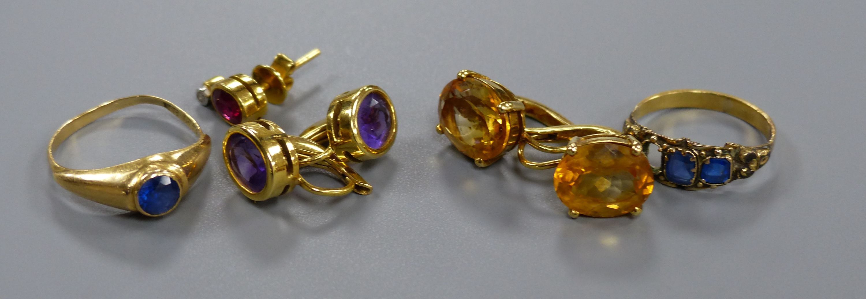 Five pairs of yellow metal and gem set earrings, gross 20.3 grams, three assorted yellow metal rings(a.f.) and a watch.